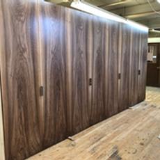 Bookmatched French Walnut Doors - Installed closets with French Walnut doors that are bookmatched